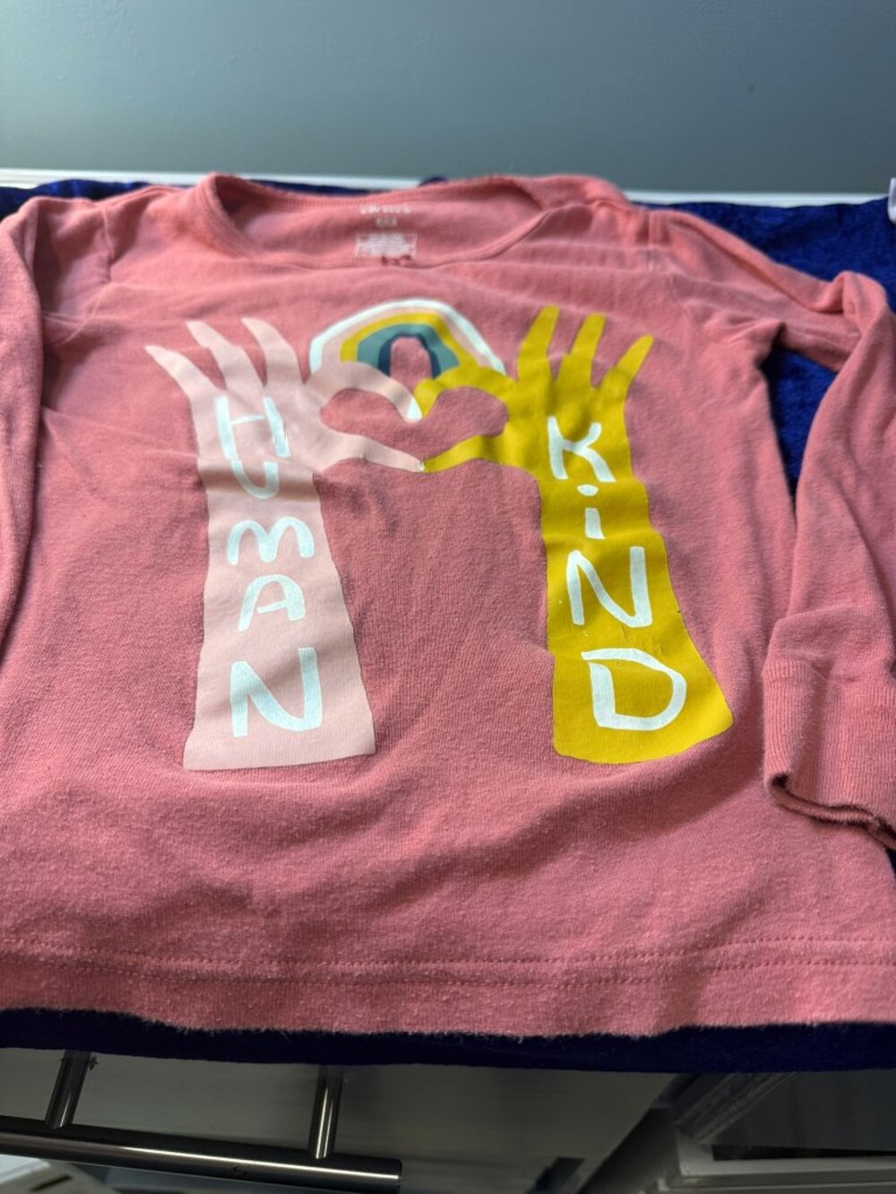 Pink Long Sleeve T-shirt with "Human Kind"